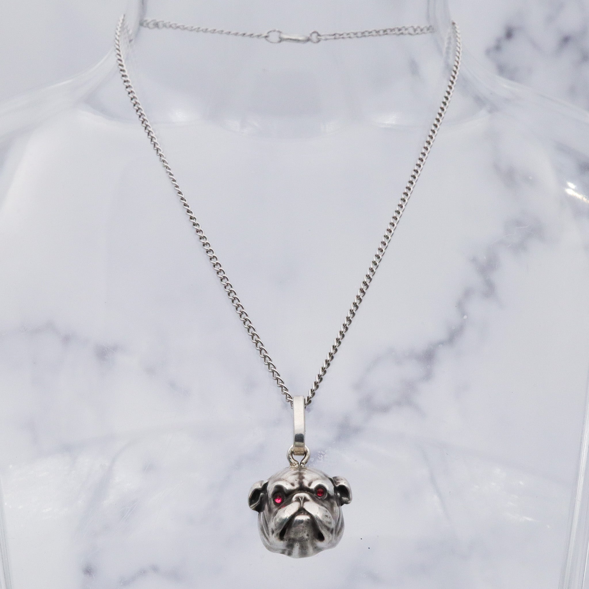 Antique Unger Brothers sterling silver bulldog with ruby glass eyes pendant